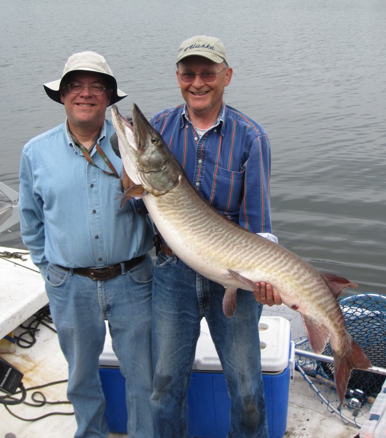 I caught this 51-inch musky on Benoit Lake on May 27, 2012.  Bryan A. was the net-man.  We released the fish.  Photo credit: Jacob Caithamer.