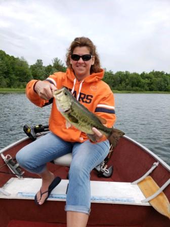Carolyn B. with a dandy bass she caught and release at Benoit Lake, June, 2020.  Good job Carolyn!