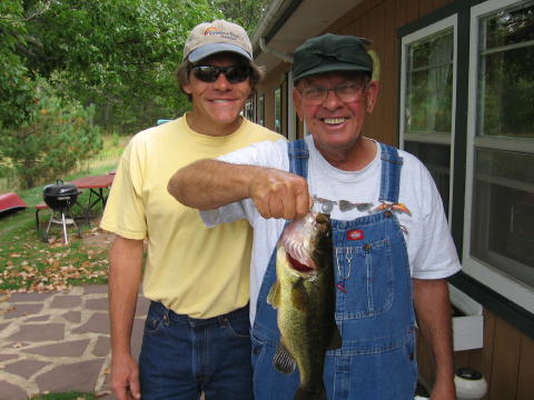 Glenn and Jim B with a nice couple of hats and a decent bass.  I think this photo was from autumn, 2005.