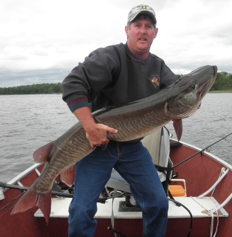 Dave Broertjes caught and released this 52 inch musky on Benoit Lake, June 8, 2011.  His wife Carolyn netted the fish and took the photo.  Great job!