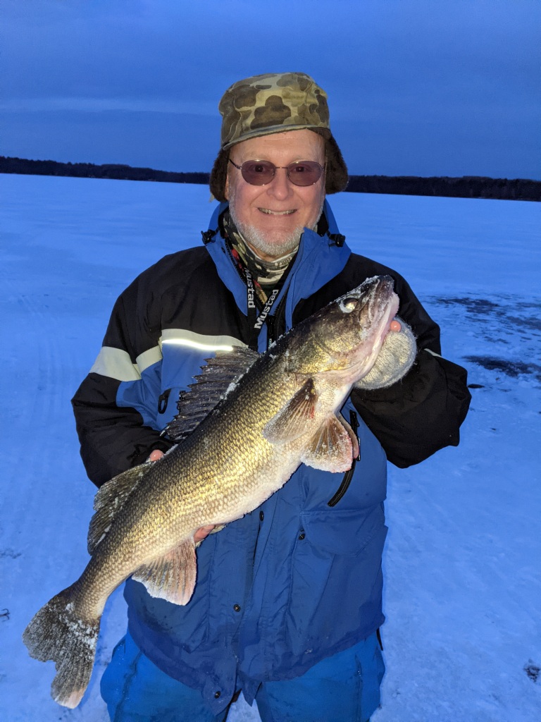 Jake and I caught and released this 26.75 inch walleye on a Burnett County Lake, December 2020.
