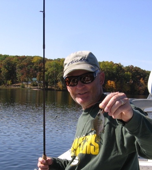 I caught this mini bluegill in 38 feet of water on Benoit Lake, Sept 30, 2012.  The depth finder was lighting up; I was hoping for crappies.