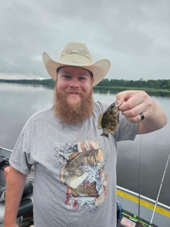 Dylan is all smiles as he releases this little guy! July 2025.