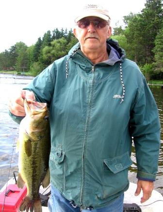 George N. with and 18.5 inch bass caught and released at Benoit Lake, June, 2008.