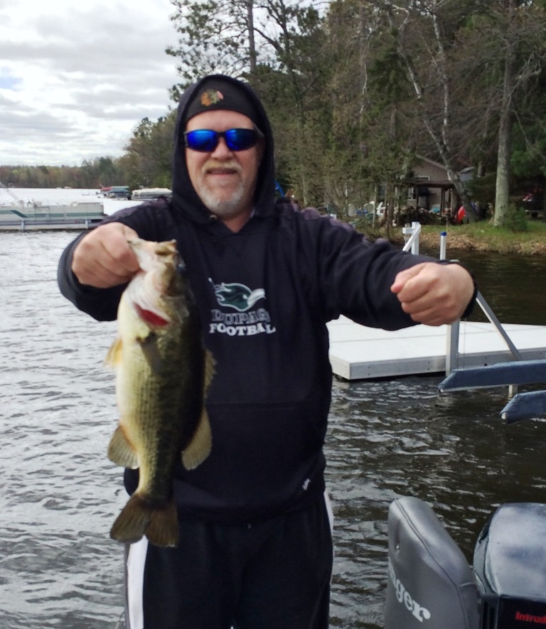 George C with a nice bass from a nearby lake.  Caught and released, late-May, 2014.