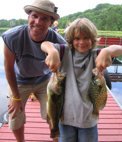 Gary and Kyler T. with a nice pair of fish, summer 2006.