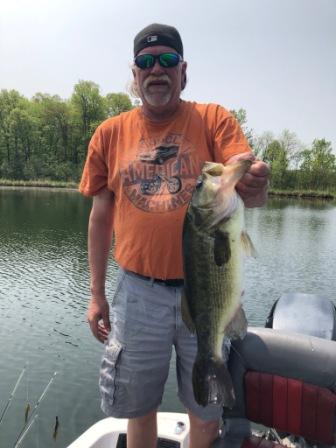 George C. with a 4 pound 8 ounce largemouth he caught and released on Benoit Lake, early-June, 2019.