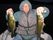 My cousin, George, and I hit a double on these 17-inch bass.  We released them both into Benoit Lake.  September 30, 2007.