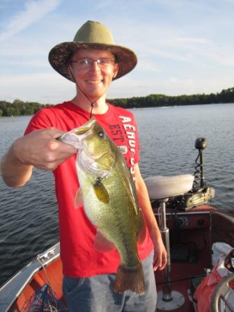 Jake C. with an 18-inch bass he caught and released on Benoit Lake, Burnett County, Wisconsin, September 2, 2018.