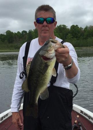 Mark C. with a beautiful bass he caught and released at a nearby lake, May, 2016.