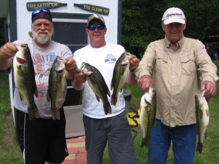 Mark, George, and George C. with some nice bass from a nearby lake (June 6, 2015)