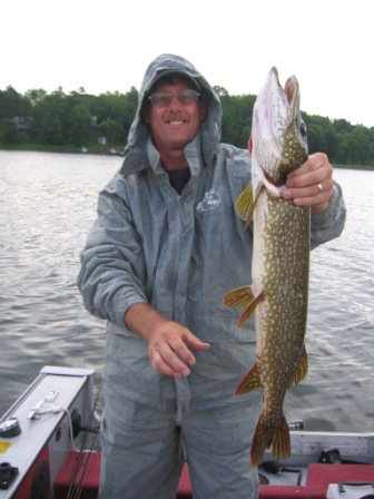 Dave B. with a 31.5 inch northern pike he caught with a spinner bait, June 25, 2015.