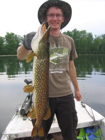 Jacob C. with a 30-inch pike from a nearby lake, June, 2016.