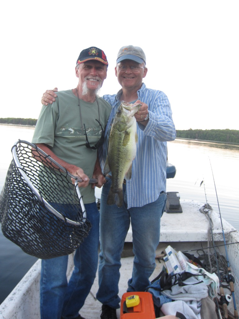 My cousin, Jim P., and I with a 19-inch bass we caught and released at a nearby lake, June, 2017.
