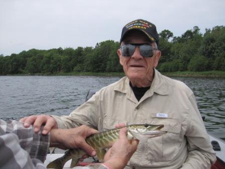 George C. with a small musky he caught and released on Benoit Lake, June, 2018.  This fish was probably one that was stocked by the DNR in fall, 2017.