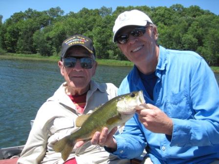 Dad and Jack N. with a nice bass from Benoit Lake, June, 2018.