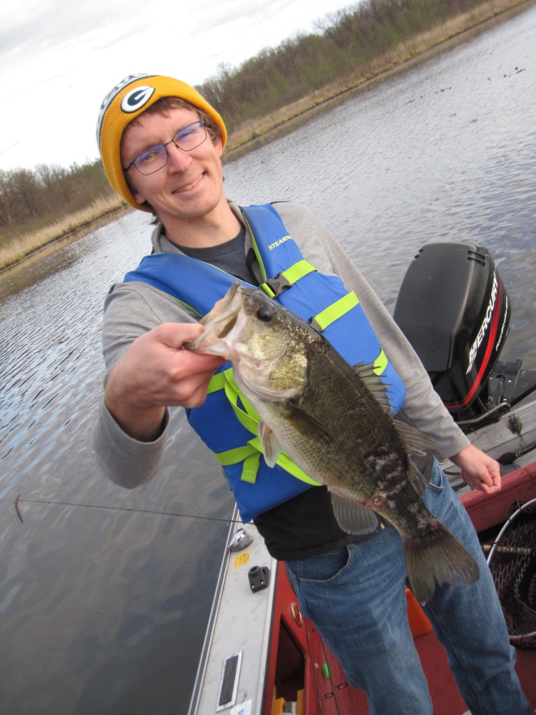 Jake C with one of 3 bass he caught in a 15-minute span on Benoit Lake, May 2021.