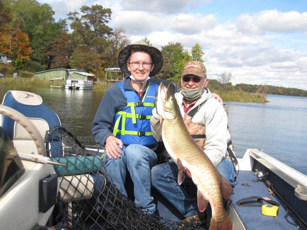 This is Jake's first musky.  He insisted that I hold it for the photo.  He caught and released this 43-incher on Benoit Lake, September 2020.