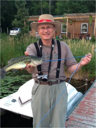 John C. caught and released this bass on Benoit Lake, July 2013.