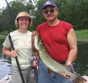 Deanna and Martin V with a beautiful 33 inch musky that Martin caught and released on Benoit Lake, June 26, 2008.  Deanna was the net person this time!  Of course they were guests at Rainbow Bay Resort.
