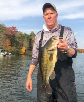 Cousin Mark C. with a beautiful bass from a nearby lake in early-October, 2020.
