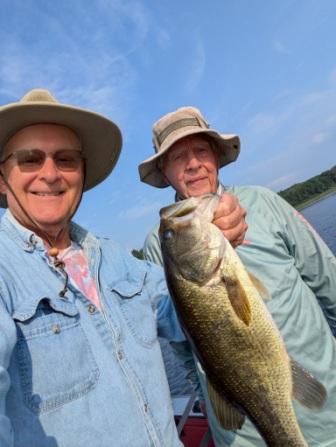 Dennis R and I teamed up for some good bass, Benoit Lake, July 2025.