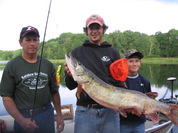 The Jackson boys with a 44 inch musky Randy caught on an area lake, August 2006.