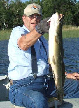 With the help of his wife Carolyn, Ray Bortle caught and released this monster bowfin on Benoit Lake.  It was an exciting afternoon for them!