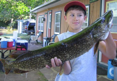 Trent Jackson with a great 34 inch pike he caught in the Yellow River.