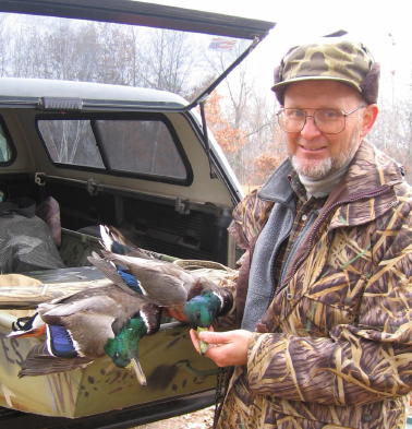 In case you were unsure, these are mallards and not bass.  And that is me.  I harvested this pair of greenheads not far from the resort, fall 2006.