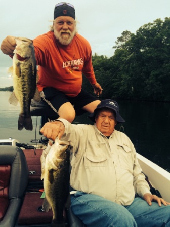 Father and son, George and George, with a pair of nice bass from a lake near Benoit, early June 2015.